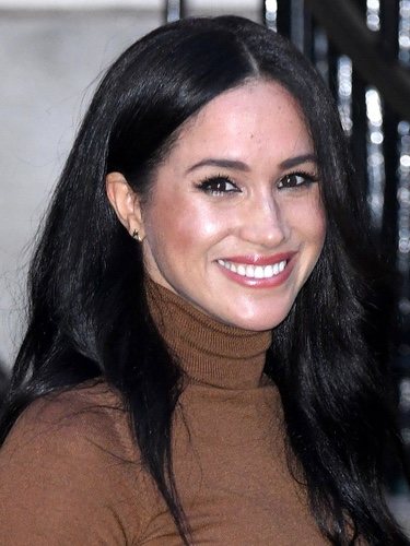 Meghan Markle with too much sparkle on her face